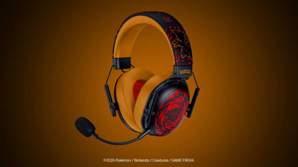 주황색 이어패드와 리자몽 그래픽을 적용한 Razer BlackShark V3 X HyperSpeed 헤드셋