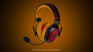주황색 이어패드와 리자몽 그래픽을 적용한 Razer BlackShark V3 X HyperSpeed 헤드셋