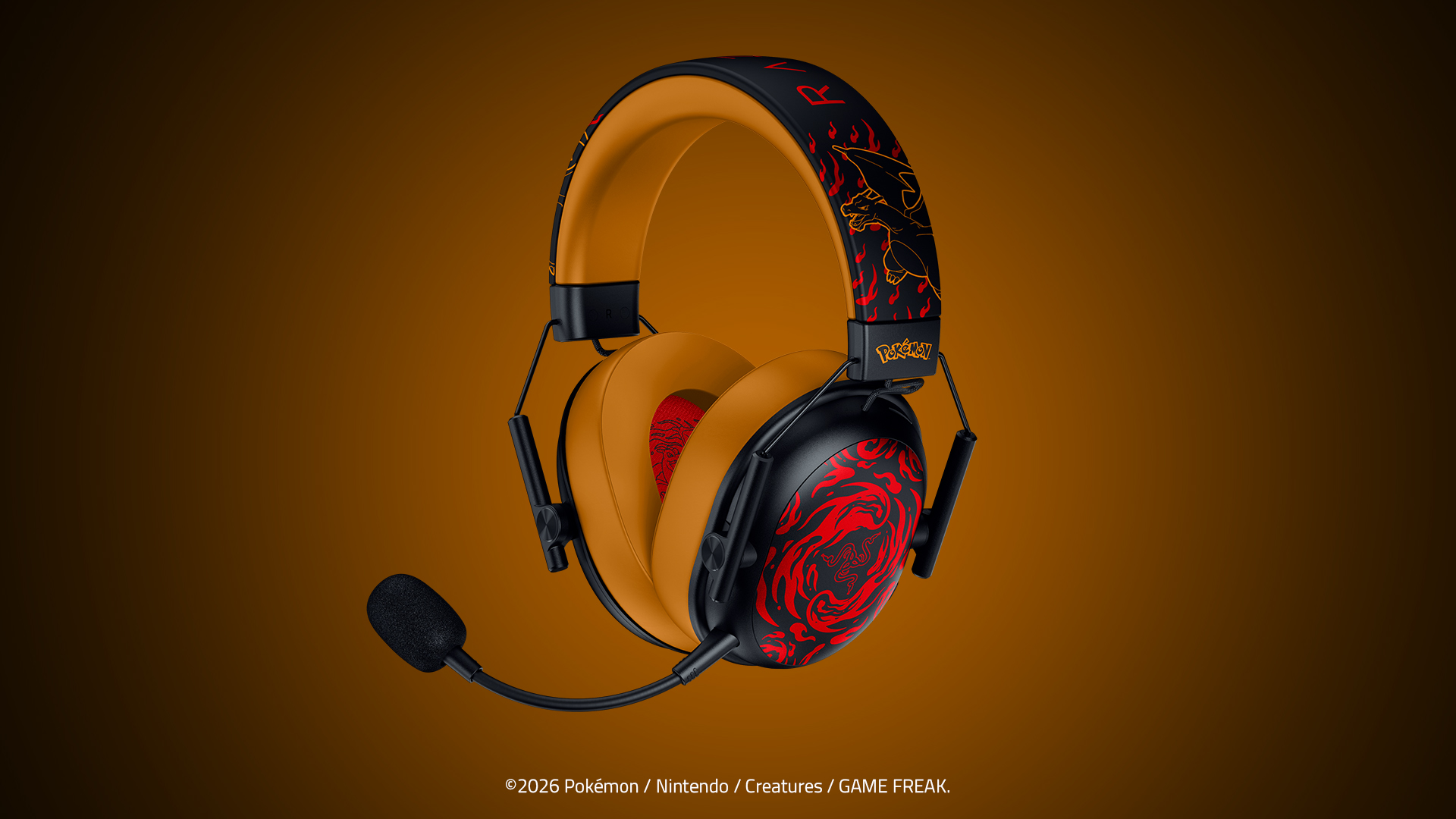 주황색 이어패드와 리자몽 그래픽을 적용한 Razer BlackShark V3 X HyperSpeed 헤드셋